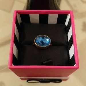 Juicy Couture Gold Ring with Sapphire Blue Stone
